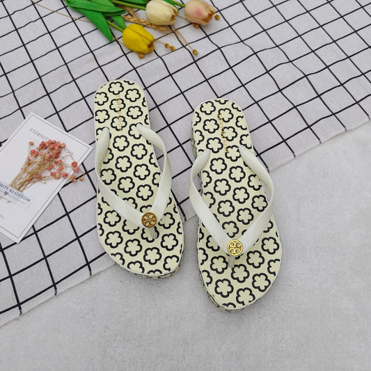 T Burch Soft Rubber Slider