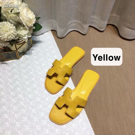 H*rmes Slipper in Yellow